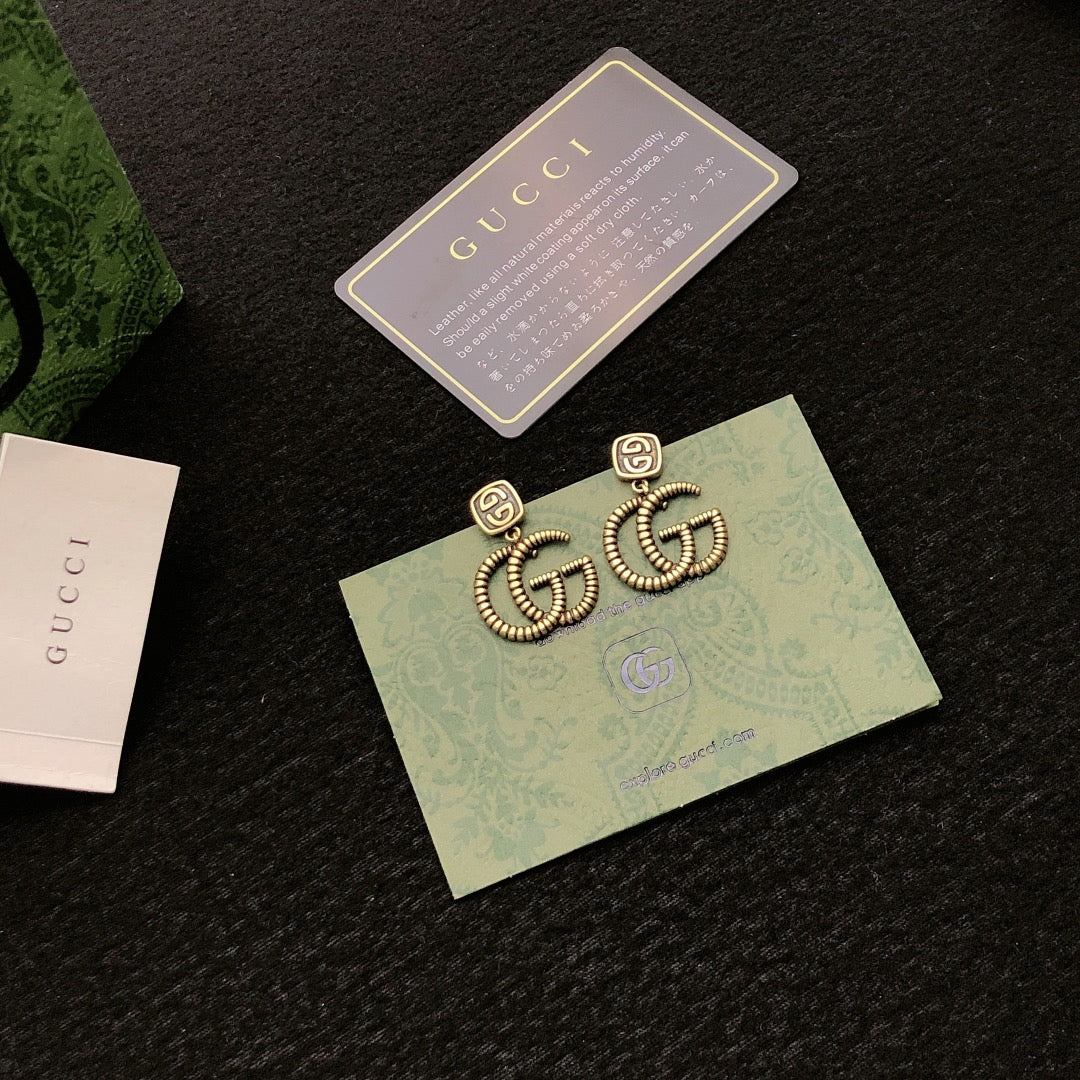Gucci Gold-Tone Interlocking G Stud Earrings - album image 2