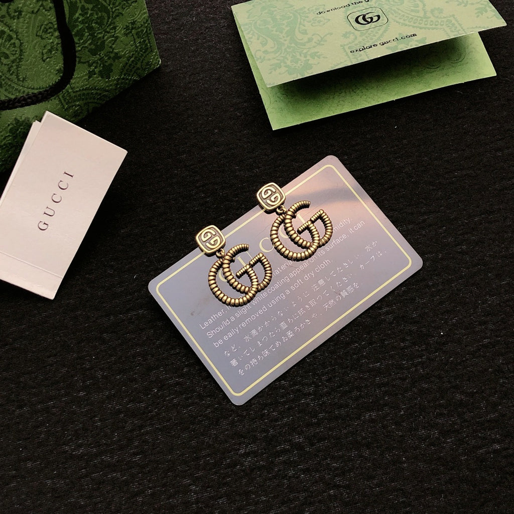 Gucci Gold-Tone Interlocking G Stud Earrings - album image 4