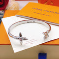 Louis Vuitton Silver-Tone Open Flower Bangle - album image 1