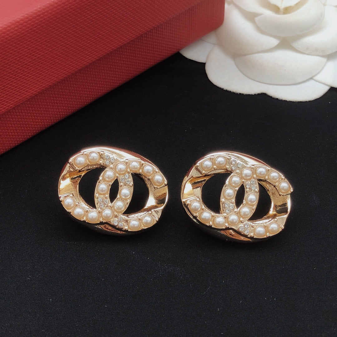 Chanel Pearl Circular Earrings - album image 6