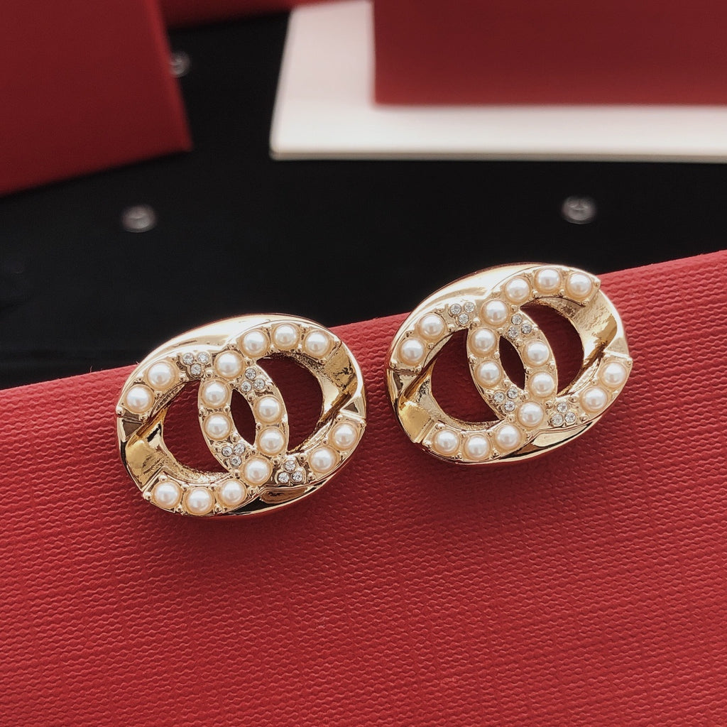 Chanel Pearl Circular Earrings - album image 1
