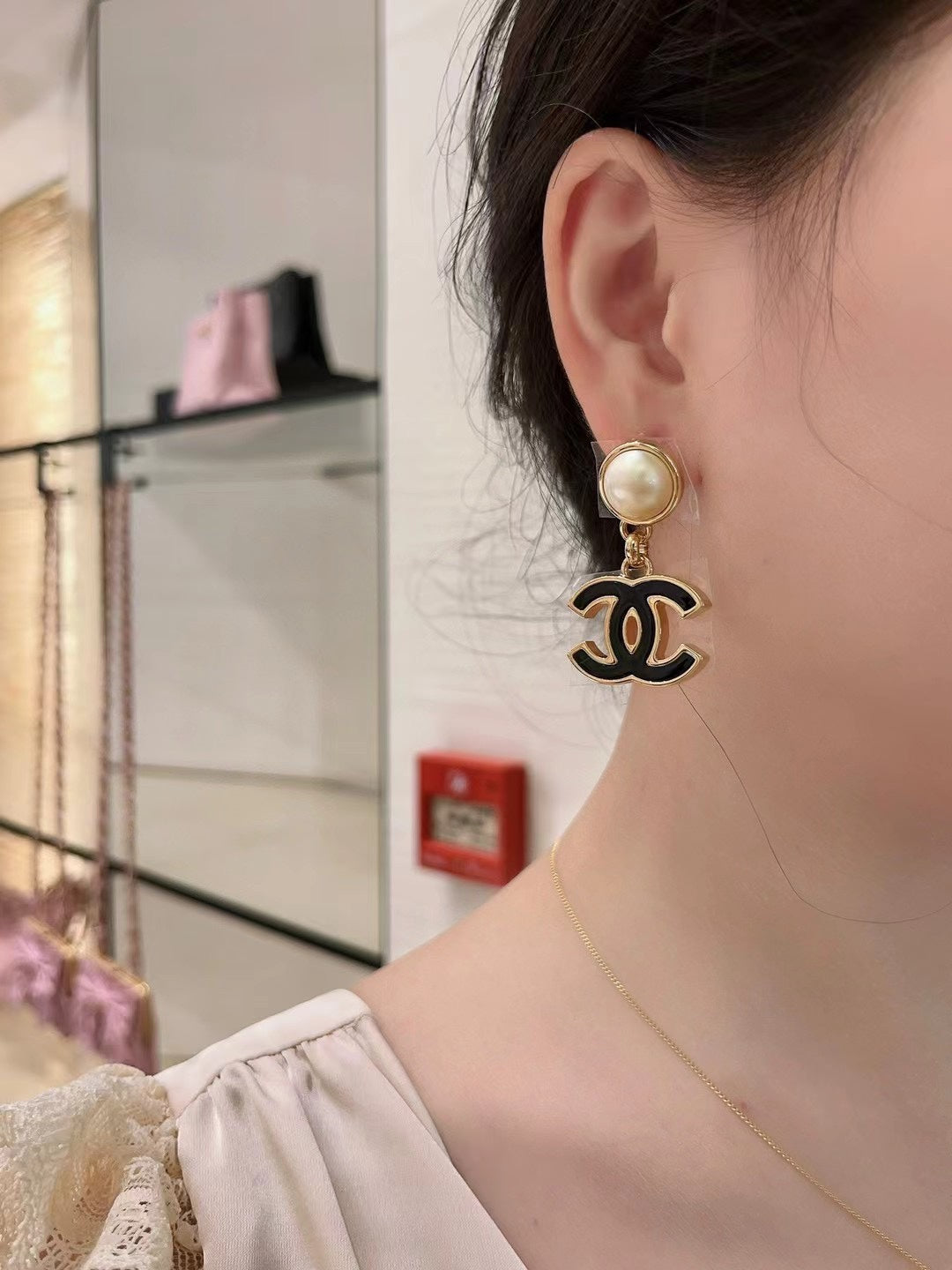 Chanel Interlocking C Black Circular Earrings - album image 5