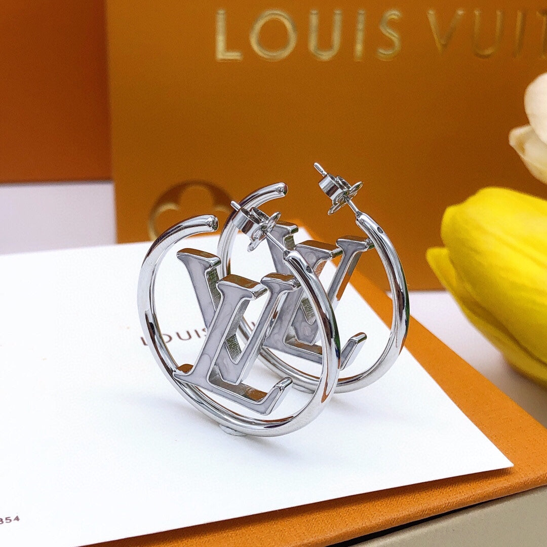 Louis Vuitton Silver-Tone Circular Earrings - album image 7