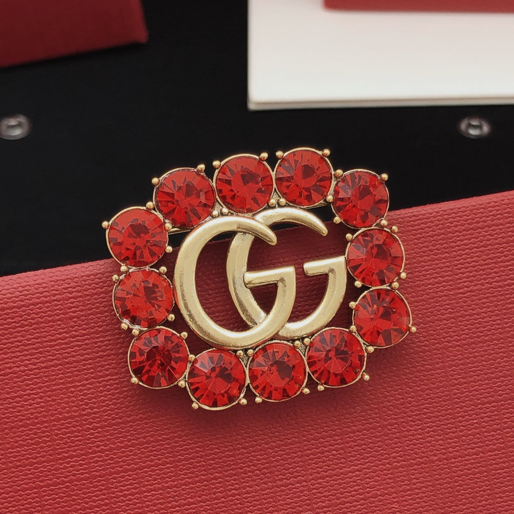 Gucci Gold-Tone Double G Red Crystal Brooch - album image 1