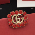 Gucci Gold-Tone Double G Red Crystal Brooch - album image 1