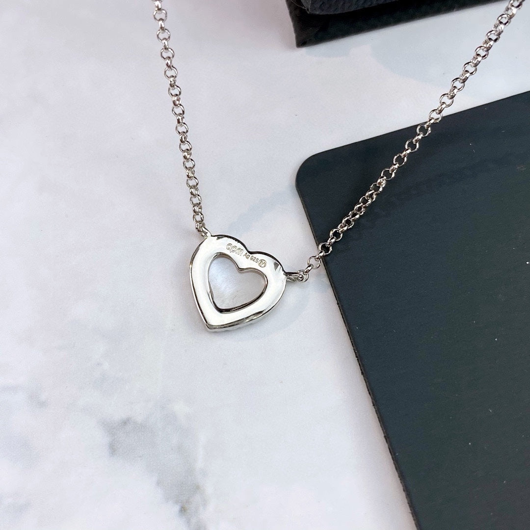 APM Monaco Silver-Tone White Shell Heart Adjustable Necklace - album image 5