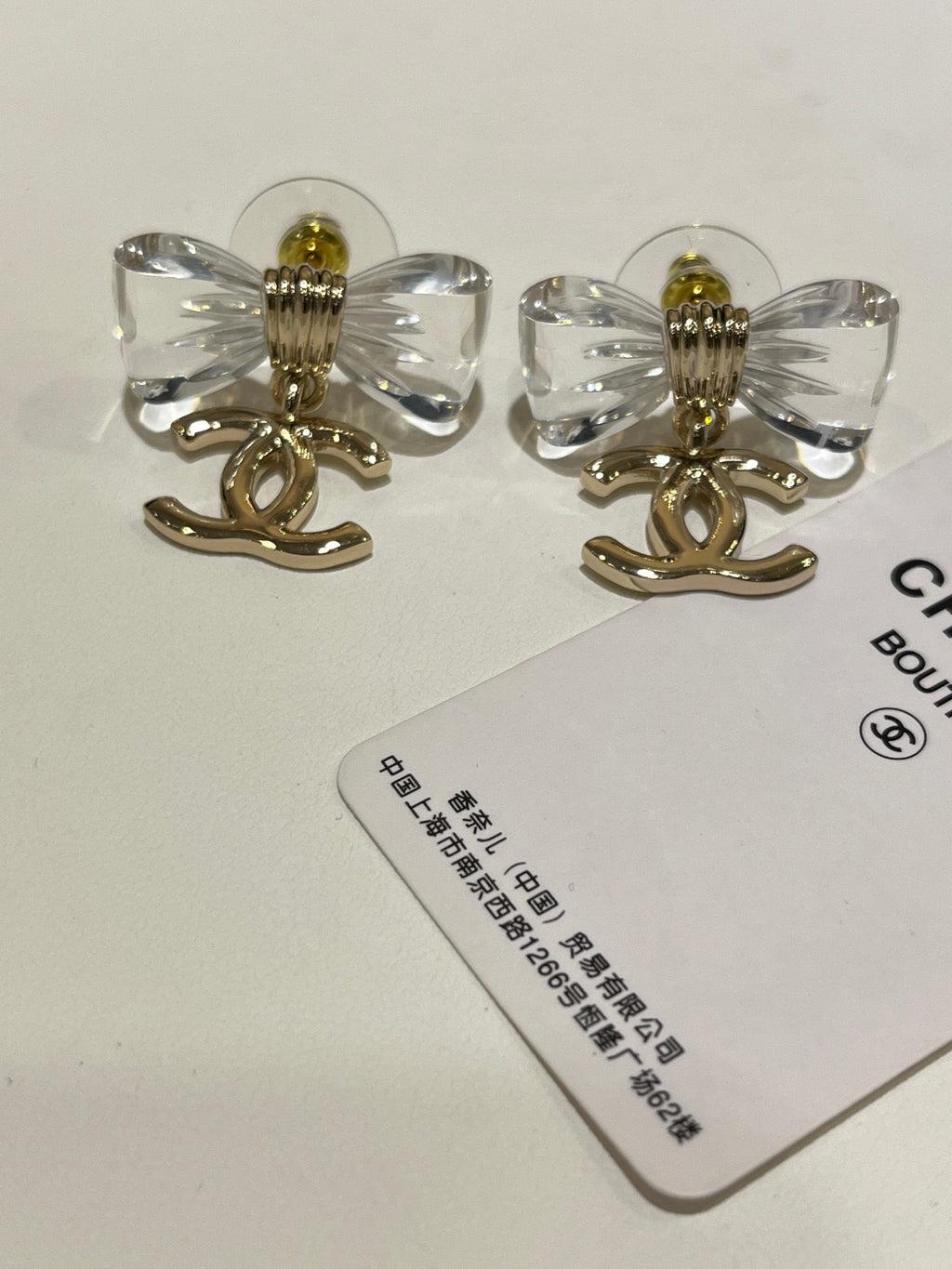 Chanel Interlocking C Bow Resin Butterfly Gold-Tone Earrings - album image 6