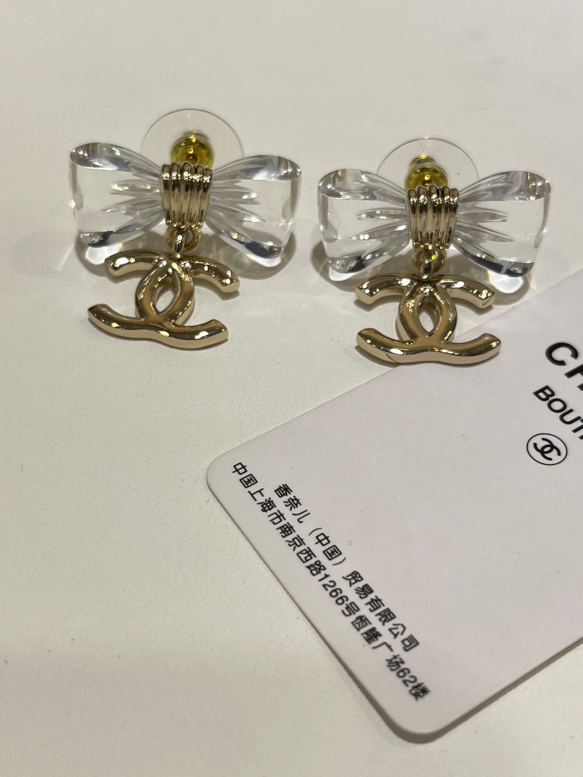Chanel Interlocking C Bow Resin Butterfly Gold-Tone Earrings - album image 6