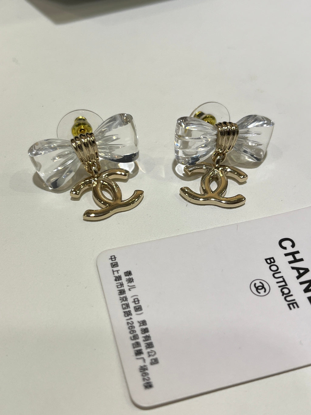 Chanel Interlocking C Bow Resin Butterfly Gold-Tone Earrings - album image 7