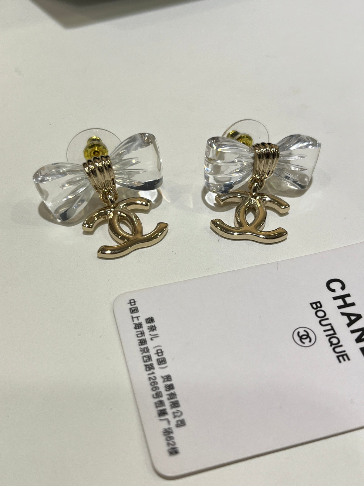 Chanel Interlocking C Bow Resin Butterfly Gold-Tone Earrings - album image 7