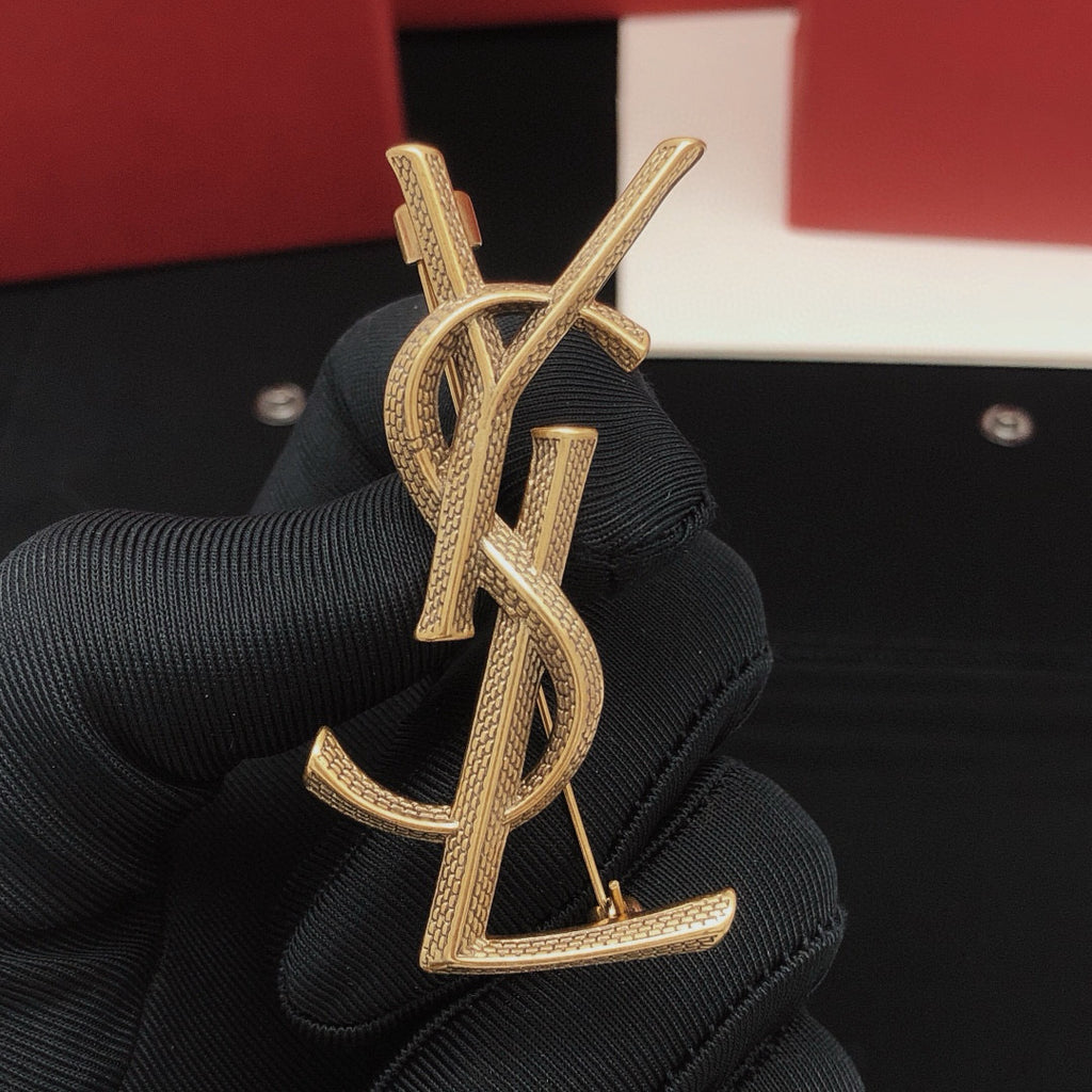 Saint Laurent Gold-Tone Scale-Textured Monogram Brooch - album image 1