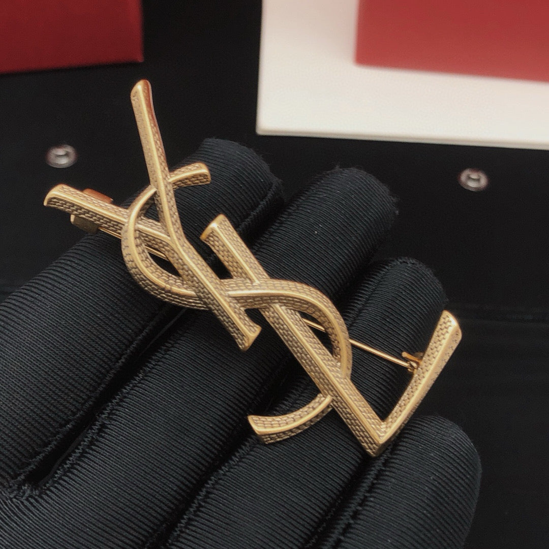 Saint Laurent Gold-Tone Scale-Textured Monogram Brooch - album image 2