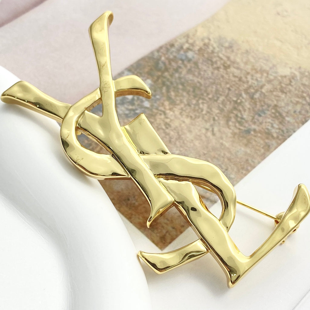Saint Laurent Gold-Tone Sculptural Textured Monogram Brooch - album image 4