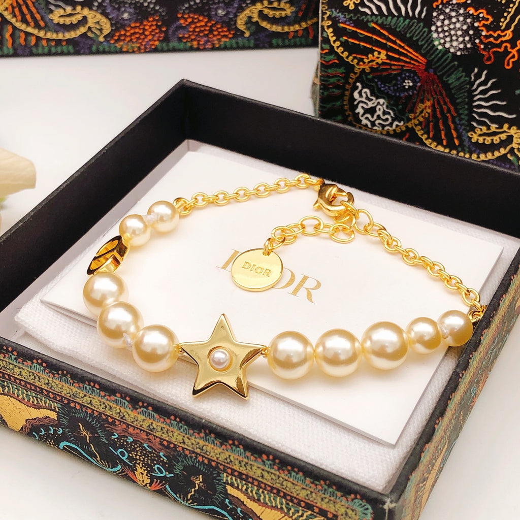 Dior Gold-Tone Star Pearl-Look Bracelet - product image 1