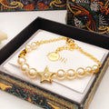 Dior Gold-Tone Star Pearl-Look Bracelet - product image 1