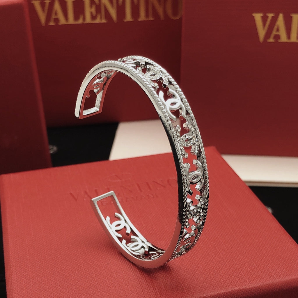 Chanel Silver-Tone Studded Open Bangle - album image 1