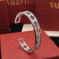 Chanel Silver-Tone Studded Open Bangle - album image 1