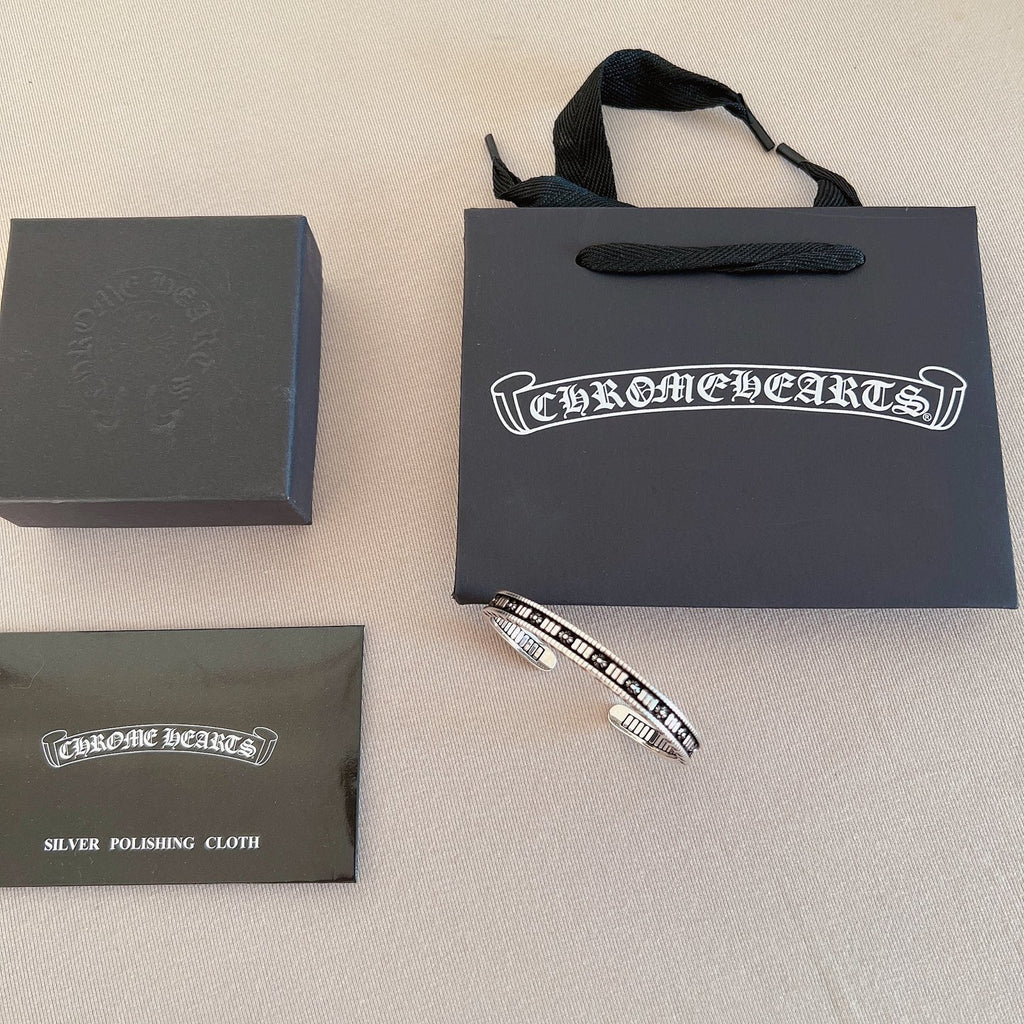Chrome Hearts Engraved Silver-Tone Open Bangle - album image 1