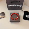 Chrome Hearts Red Bead Gold Detail Bracelet - album image 1