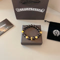 Chrome Hearts Black Bead Gold Cross Bracelet - album image 1