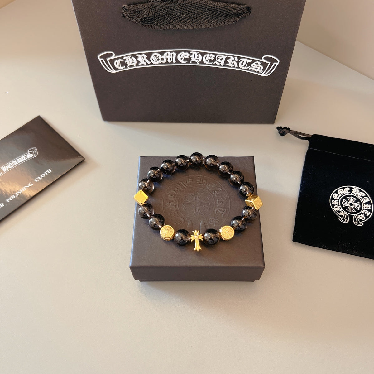 Chrome Hearts Black Bead Gold Cross Bracelet - album image 1