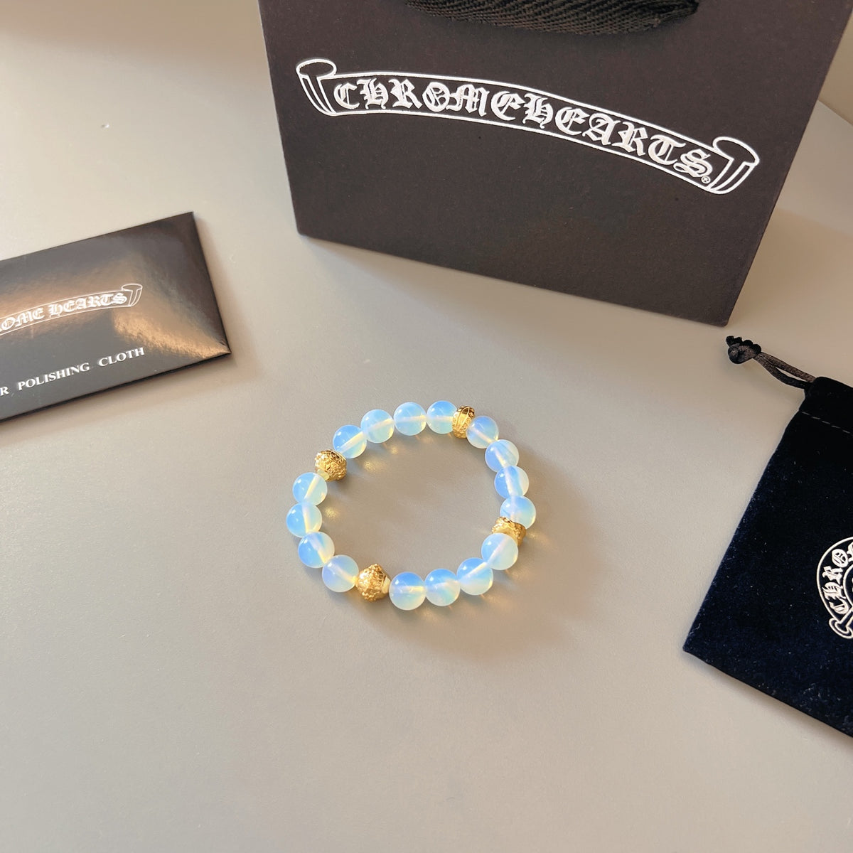 Chrome Hearts Pale Blue Bead Gold Accent Bracelet - album image 4