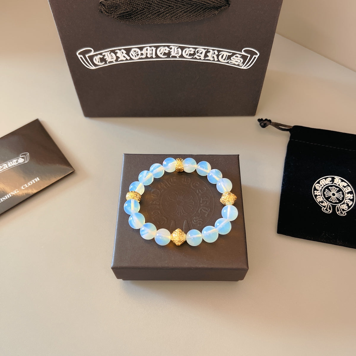 Chrome Hearts Pale Blue Bead Gold Accent Bracelet - album image 1