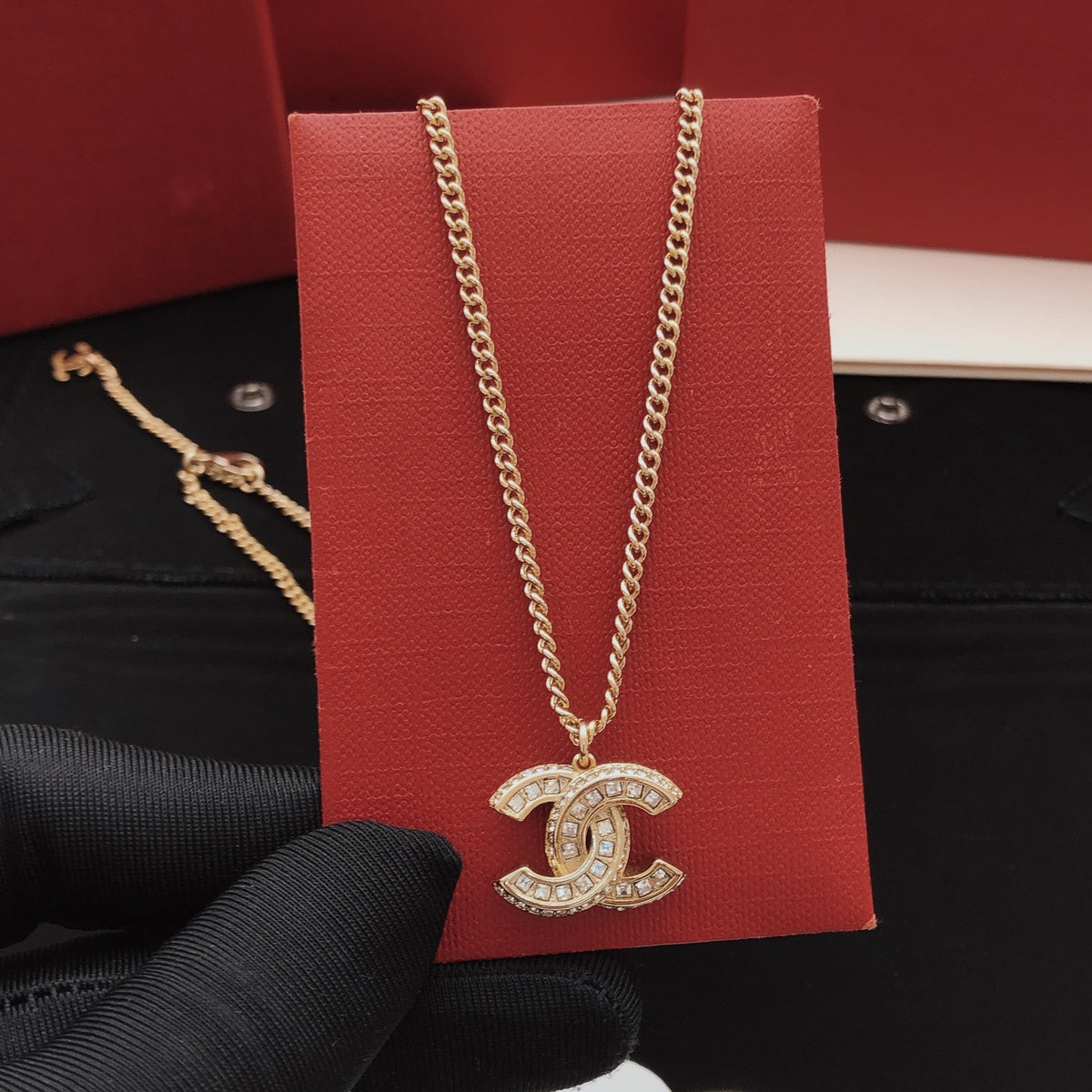 Chanel Interlocking C Gold-Tone Crystal Accent Necklace - album image 1