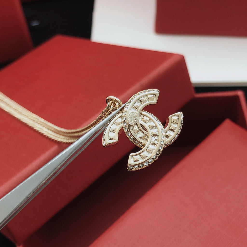Chanel Interlocking C Gold-Tone Crystal Accent Necklace - album image 7