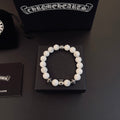 Chrome Hearts Cream Bead Engraved Spacer Bracelet - album image 1