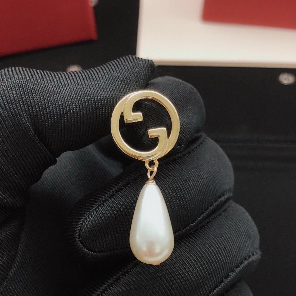 Gucci Teardrop Pearl Earrings - album image 4