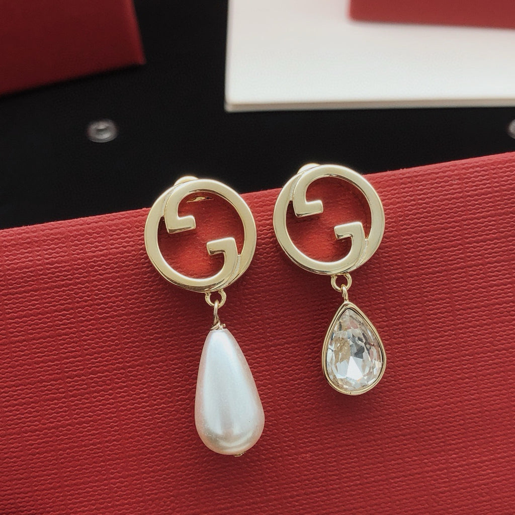 Gucci Teardrop Pearl Earrings - album image 1
