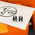 Hermès Navy H Stud Earrings - album image 1