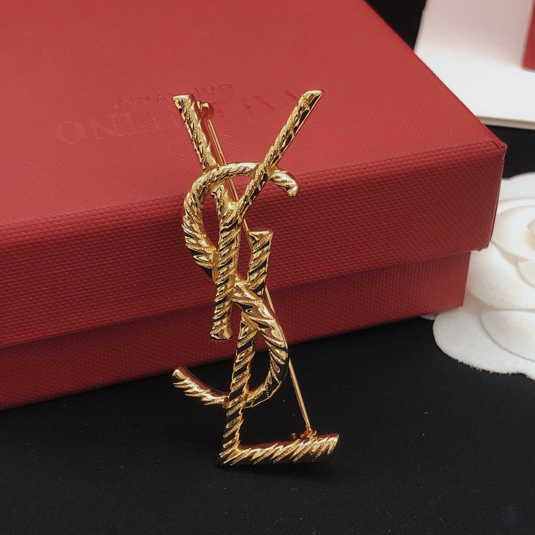 Saint Laurent Gold-Tone Twisted Monogram Brooch - album image 8