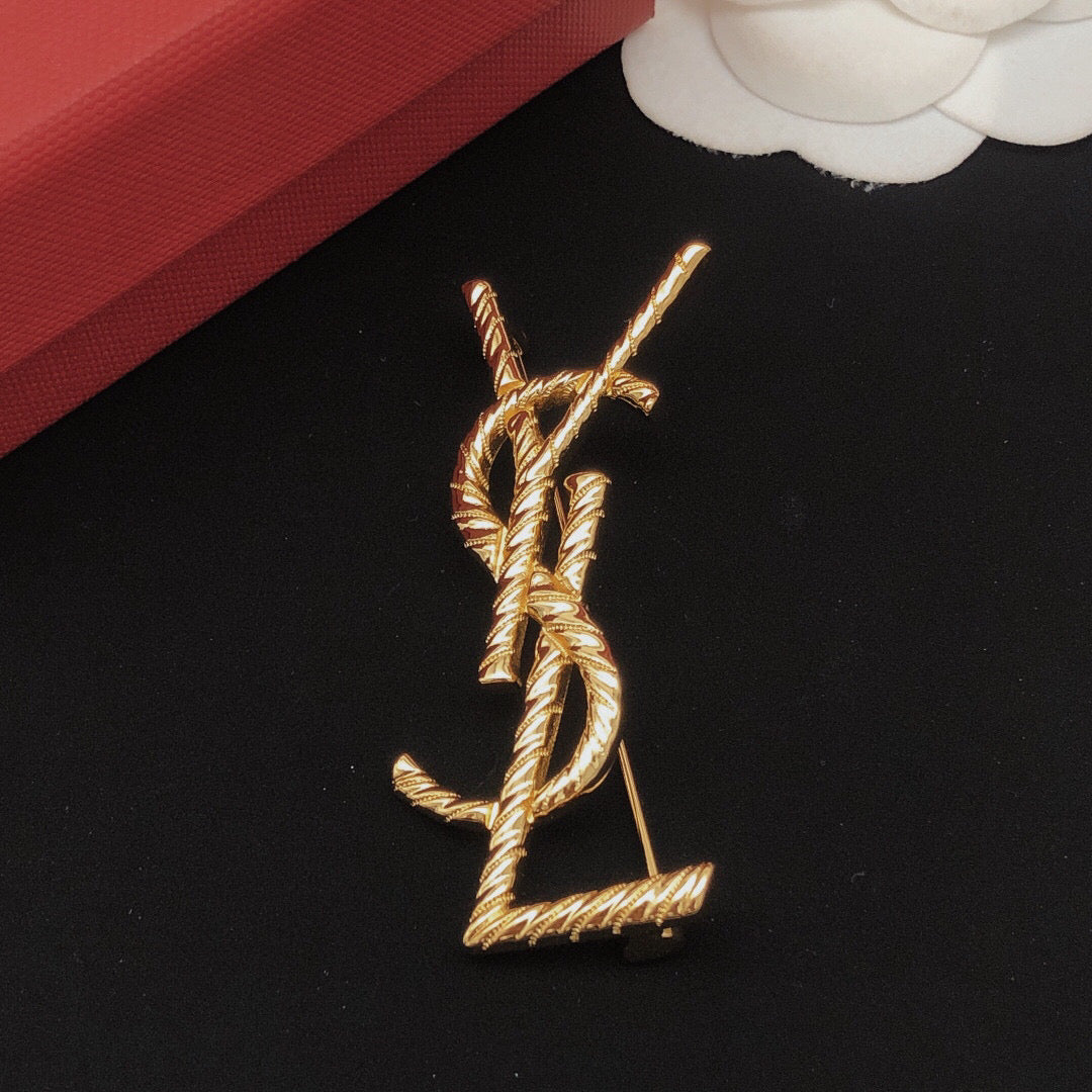 Saint Laurent Gold-Tone Twisted Monogram Brooch - album image 7