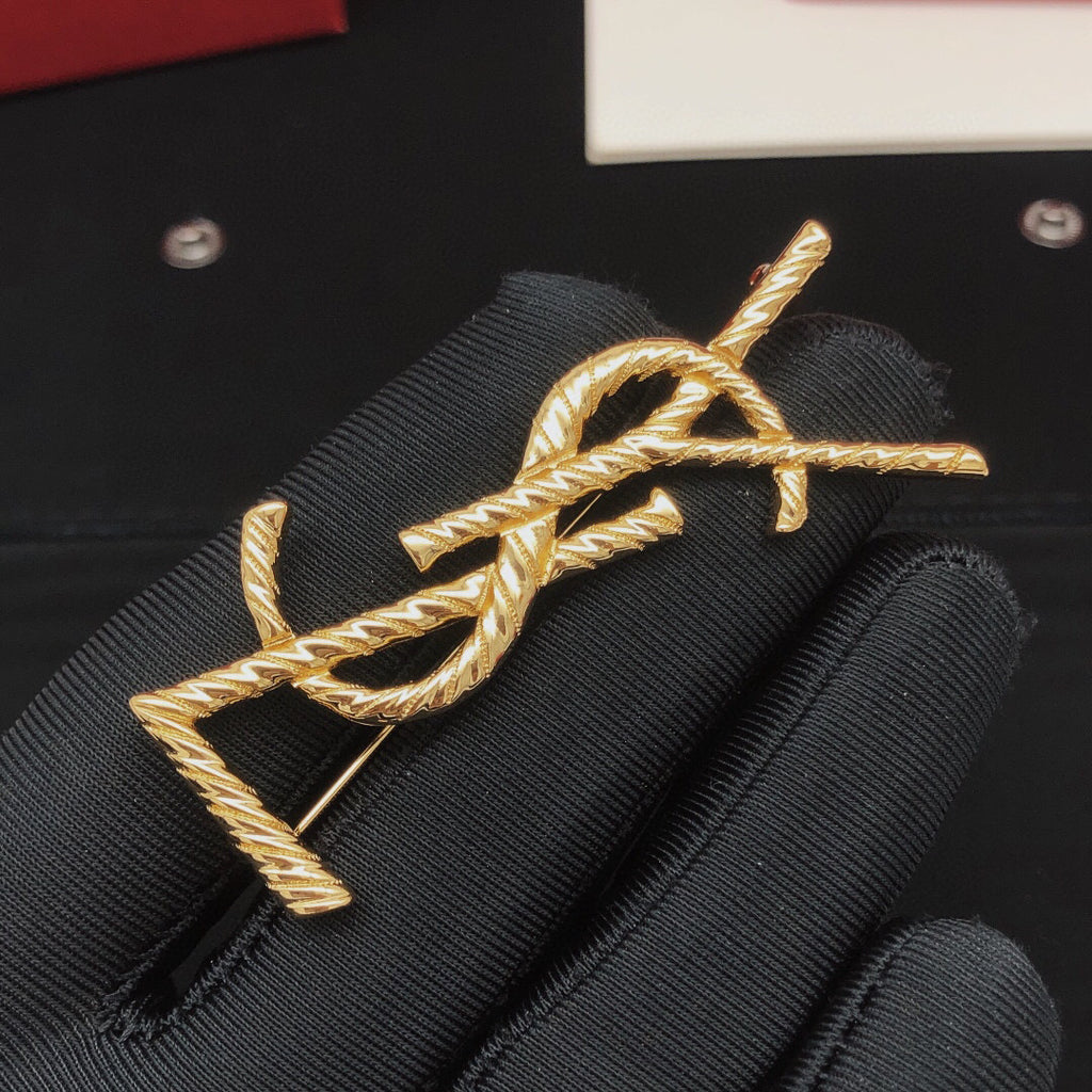 Saint Laurent Gold-Tone Twisted Monogram Brooch - album image 3
