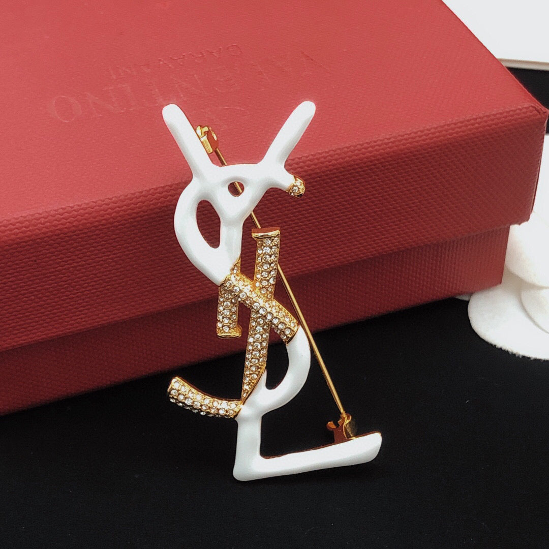 Saint Laurent Gold-Tone White Enamel Monogram Brooch - album image 2