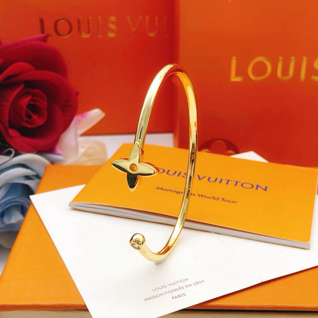 Louis Vuitton Gold-Tone Open LV Bangle - album image 4