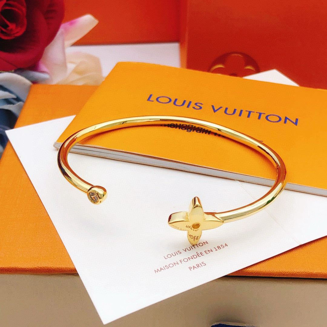 Louis Vuitton Gold-Tone Open LV Bangle - album image 3