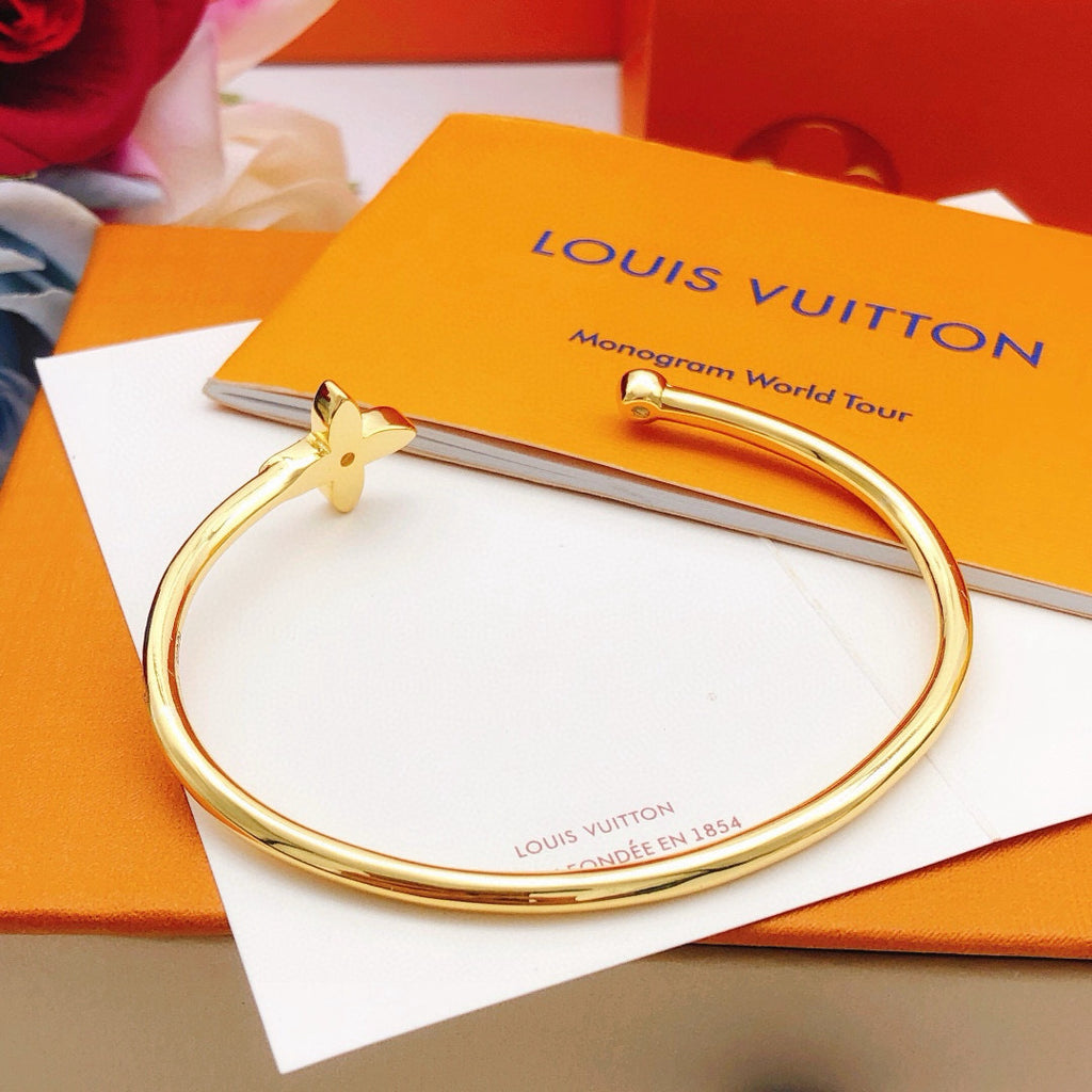 Louis Vuitton Gold-Tone Open LV Bangle - album image 5