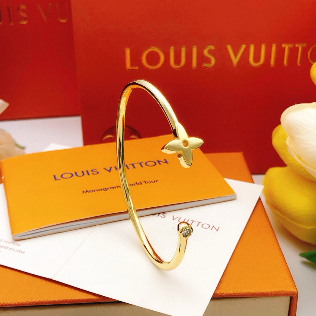Louis Vuitton Gold-Tone Open LV Bangle - album image 1