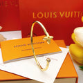 Louis Vuitton Gold-Tone Open LV Bangle - album image 1