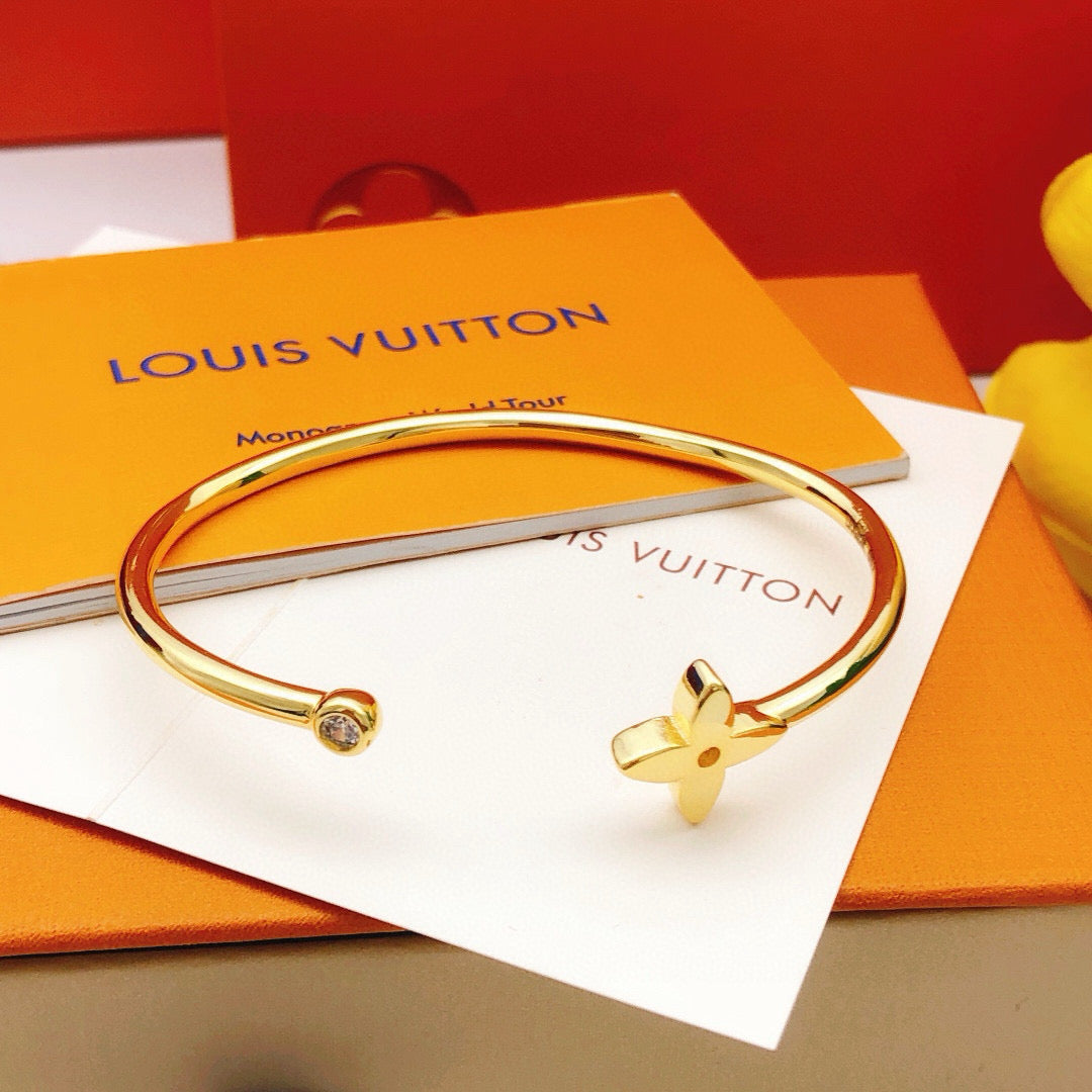 Louis Vuitton Gold-Tone Open LV Bangle - album image 2
