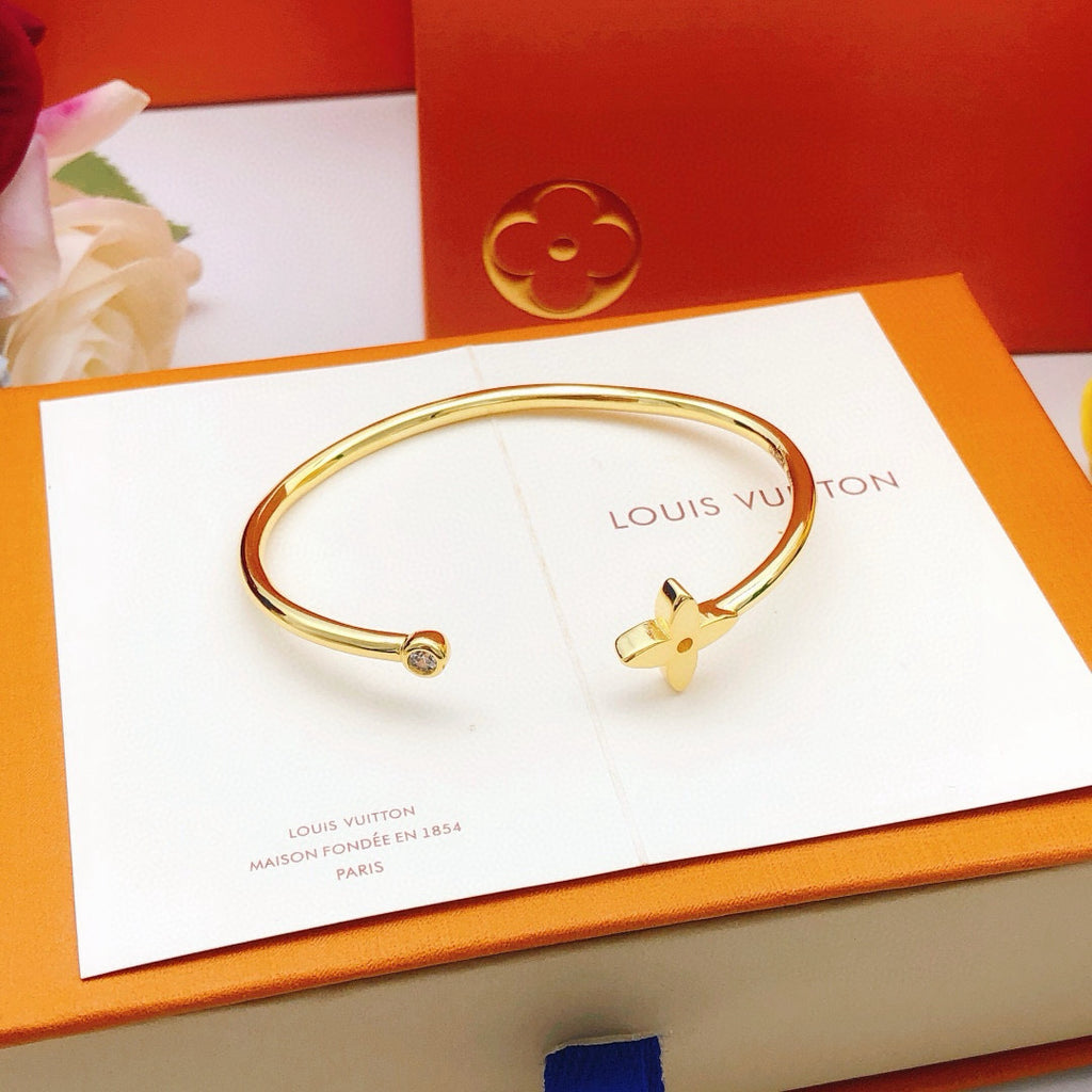 Louis Vuitton Gold-Tone Open LV Bangle - album image 6