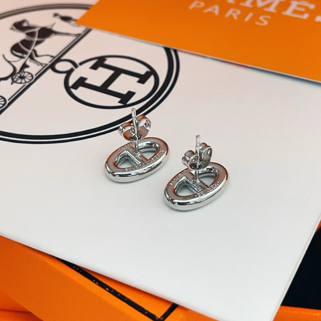 Hermès Silver-Tone Oval H Stud Earrings - album image 11