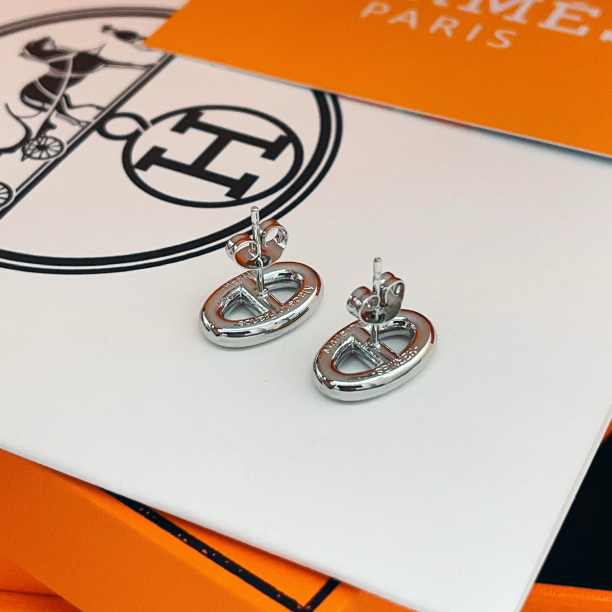 Hermès Silver-Tone Oval H Stud Earrings - album image 11