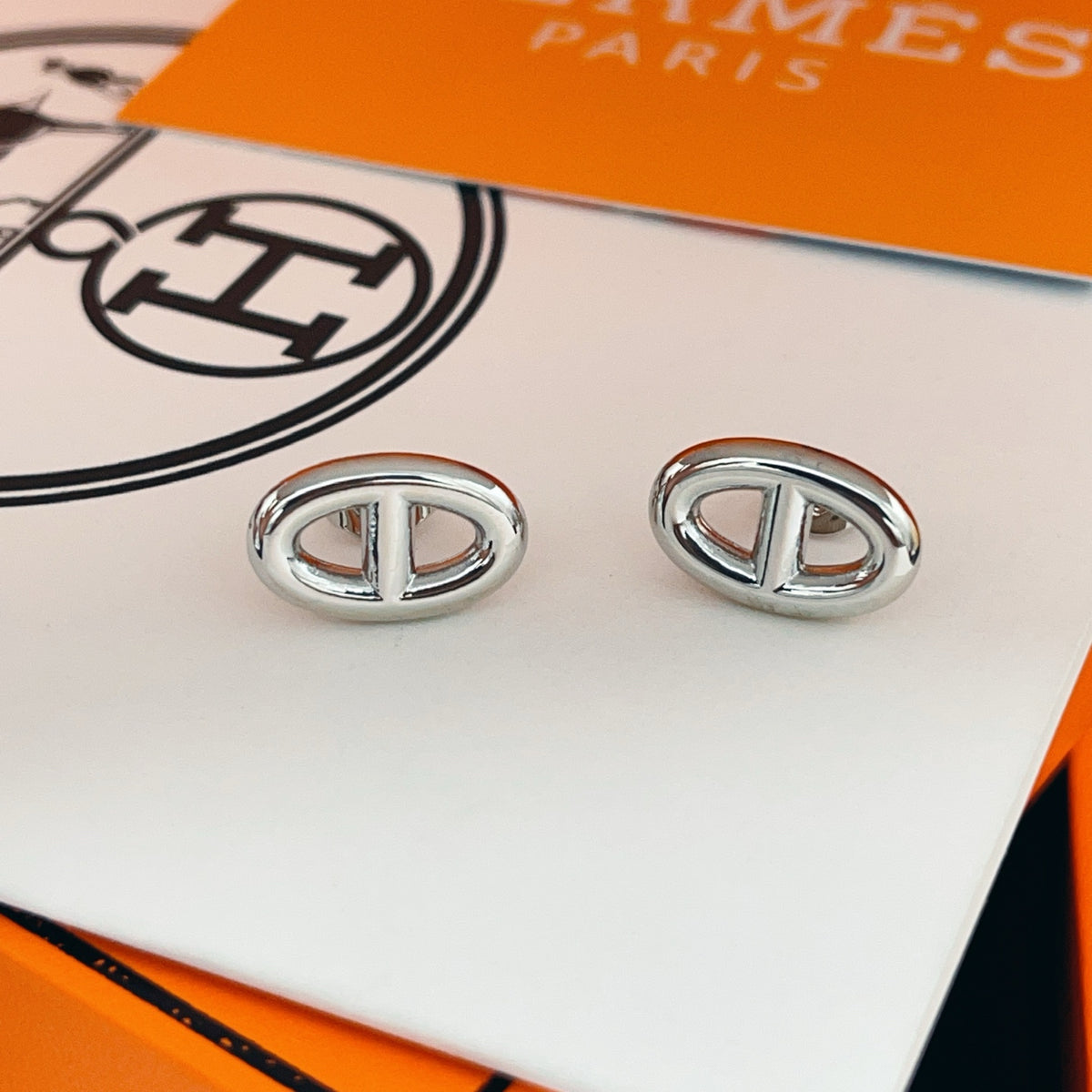 Hermès Silver-Tone Oval H Stud Earrings - album image 9