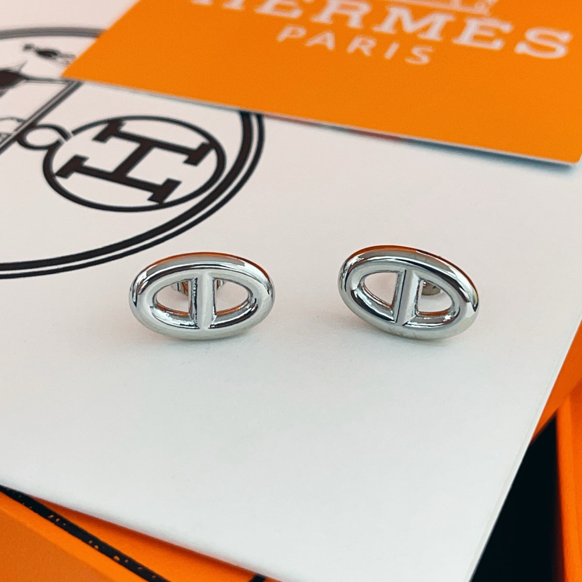 Hermès Silver-Tone Oval H Stud Earrings - album image 10