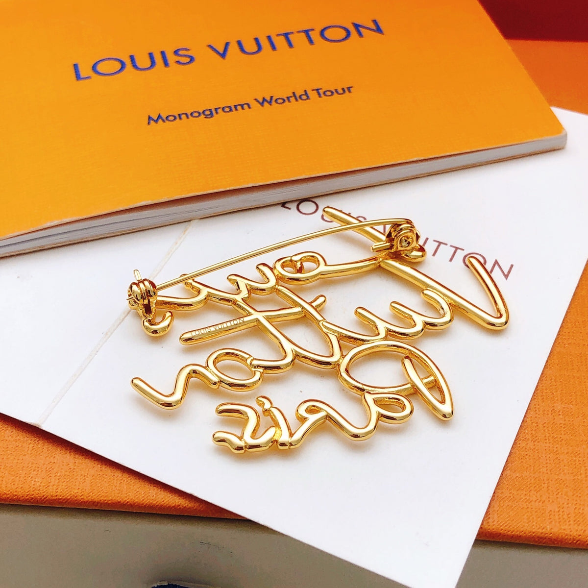 Louis Vuitton Gold-Tone Louis Vuitton Paris Script Brooch - album image 3