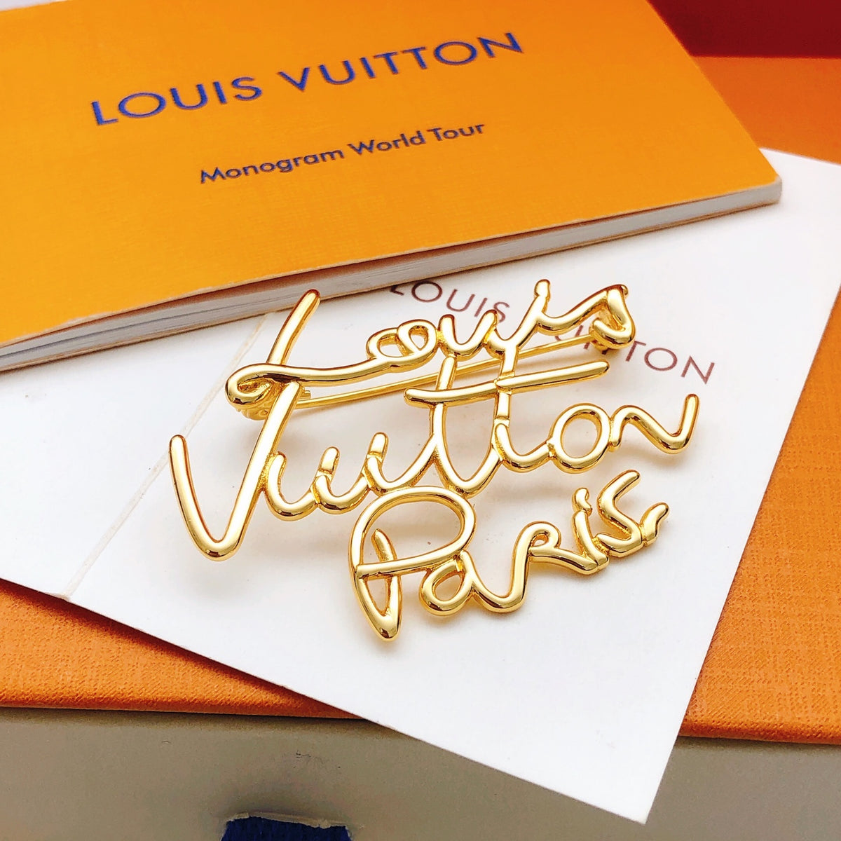 Louis Vuitton Gold-Tone Louis Vuitton Paris Script Brooch - album image 2